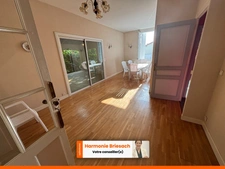 Maison familiale avec grand jardin, terrasse couverte et garage