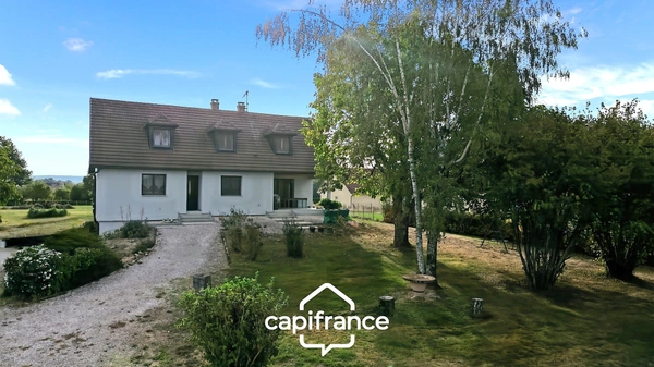 Maison familiale 5 chambres, sous-sol complet et terrain arboré de 3 000 m² à SAILLENARD (71)