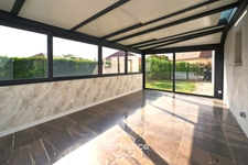 Maison de plain-pied, 3 chambres, véranda, piscine chauffée et jardin paysager – Courlaoux, à 10 min de Lons-le-Saunier (39000)