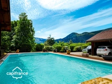 01300 CUZIEU MAISON BOIS MASSIF TYPE CHALET, 146 m² ,PLAIN-PIED TERRASSE, GARAGE,PISCINE, TERRAIN 1100 M2