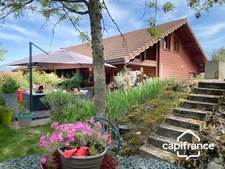 01300 CUZIEU MAISON BOIS MASSIF TYPE CHALET, 146 m² ,PLAIN-PIED TERRASSE, GARAGE,PISCINE, TERRAIN 1100 M2