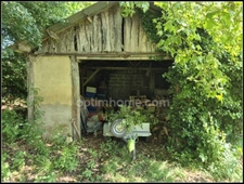 Maison en pierre avec dépendances, piscine, et terrain à Saint Puy