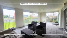 3-room apartment with a 30 m² covered terrace, 2 parking spaces and a garage - Quick access to the city center and train station
