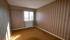 Appartement T5 de 100 m² avec balcon, ascenseur, cave et stationnement – Fort potentiel à Limoges
