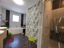 Single-storey 3-bedroom property · Saltwater swimming pool · Underfloor heating