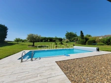 Single-storey 3-bedroom property · Saltwater swimming pool · Underfloor heating