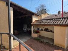  Charme de l'ancien : Maison familiale avec jardin, offrant 240m2 de surface totale au sol