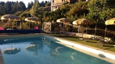 Dpt Corse (20), à vendre EVISA, propriété avec six chalets en bois, terrasse vue panoramique, piscine, parking