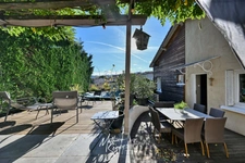 Maison de village avec jardin paysager