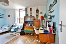 Maison 8 pièces TASSIN LE BOURG (69) de 157m² avec piscine, sous sol et garage - Parcelle de 817m²