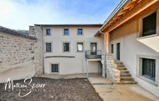 Sur les hauteurs de Thurins - Plateau de 100m² en duplex à aménager avec terrasse, 2 stationnements et 1 cave 