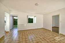 CHARBONNIERES LES BAINS (69) Appartement T2 de 45m² avec jardin de 84m² - Façade refaite 2025 et huisseries changées 2025