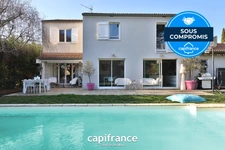 Maison 8 pièces TASSIN LE BOURG (69) de 157m² avec piscine, sous sol et garage - Parcelle de 817m²
