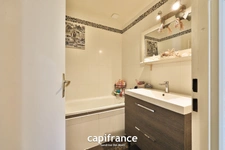 Maison 8 pièces TASSIN LE BOURG (69) de 157m² avec piscine, sous sol et garage - Parcelle de 817m²