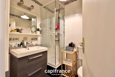 Maison 8 pièces TASSIN LE BOURG (69) de 157m² avec piscine, sous sol et garage - Parcelle de 817m²