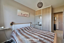 St Genis Laval - Appartement T3 de 61m² avec place de stationnement et cave dans résidence sécurisée avec ascenseur