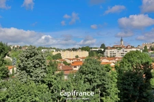 St Genis Laval - Appartement T3 de 61m² avec place de stationnement et cave dans résidence sécurisée avec ascenseur