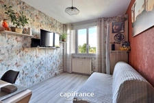 St Genis Laval - Appartement T3 de 61m² avec place de stationnement et cave dans résidence sécurisée avec ascenseur