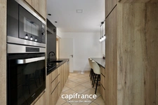 TASSIN LA DEMI LUNE - Appartement T4 de 81,51 m² avec balcon et cave + garage en sus