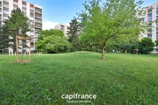 St Genis Laval - Appartement T3 de 61m² avec place de stationnement et cave dans résidence sécurisée avec ascenseur