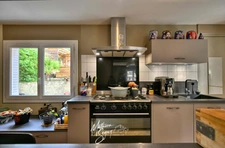 Maison de village avec jardin paysager