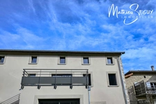 Sur les hauteurs de Thurins - Plateau de 100m² en duplex à aménager avec terrasse, 2 stationnements et 1 cave 