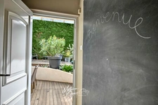 Maison de village avec jardin paysager