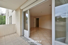 TASSIN LA DEMI LUNE - Appartement T4 de 81,51 m² avec balcon et cave + garage en sus