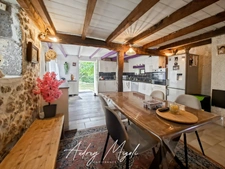 Maison en pierre au cœur de la nature, 109m², 3 chambres, garage et grande dépendance, au bord d'une rivière, terrain 1 hectare
