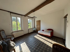 Maison individuelle avec fort potentiel – Cadre calme et verdoyant