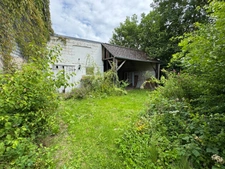 Maison individuelle avec fort potentiel – Cadre calme et verdoyant