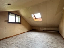 Maison individuelle avec fort potentiel – Cadre calme et verdoyant