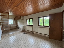 Maison individuelle avec fort potentiel – Cadre calme et verdoyant
