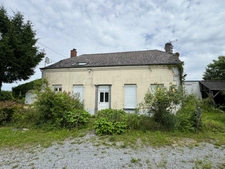 Maison individuelle avec fort potentiel – Cadre calme et verdoyant