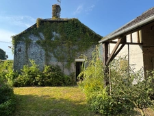 Maison individuelle avec fort potentiel – Cadre calme et verdoyant