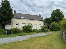Maison individuelle avec fort potentiel – Cadre calme et verdoyant