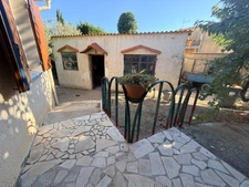 MAISON INDIVIDUELLE – TERRAIN DE 607 M² – GARAGES – PISCINABLE – POSSIBILITÉS D’AGRANDISSEMENT ET DE SURÉLÉVATIONPEROLS (34)