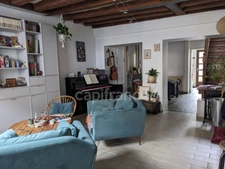 RIVE DROITE - MAISON DE CARACTERE AVEC AGREABLE JARDIN