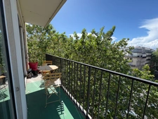 Paris 18e – Ordener / Marcadet – 6ème étage avec ascenseur, balcon-terrasse et vue dégagée