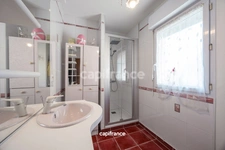 SITUÉE AU MANS PROCHE ZONE NORD - 3 CHAMBRES AVEC GARAGE ET JARDIN