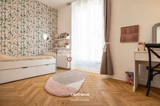 APPARTEMENT DE STYLE HAUSSMANNIEN D'EXCEPTION AVEC GRANDE PIÈCE À VIVRE DE PLUS DE 70M2