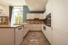 APPARTEMENT DE STYLE HAUSSMANNIEN D'EXCEPTION AVEC GRANDE PIÈCE À VIVRE DE PLUS DE 70M2