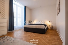 APPARTEMENT DE STYLE HAUSSMANNIEN D'EXCEPTION AVEC GRANDE PIÈCE À VIVRE DE PLUS DE 70M2