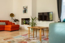 APPARTEMENT DE STYLE HAUSSMANNIEN D'EXCEPTION AVEC GRANDE PIÈCE À VIVRE DE PLUS DE 70M2
