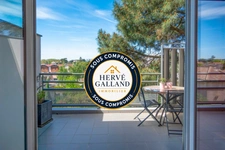 T3 traversant Est/Ouest, climatisé, balcon + garage & parking – Emplacement recherché à Bron (69)