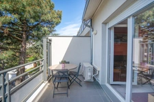 T3 traversant Est/Ouest, climatisé, balcon + garage & parking – Emplacement recherché à Bron (69)