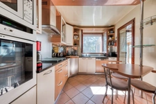 Elégante maison Familiale de 8 pièces 180m² avec Vie de Plain-Pied 6 Chambres - DPE C- Véranda et terrain arboré de 756m² 