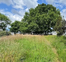 MESQUER - BEAU TERRAIN CONSTRUCTIBLE A VENDRE AU CALME - ACCÈS TOUT À PIED OU À VÉLO