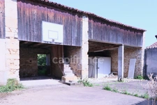Ensemble Immobilier d'Exception : Commerce et Locatif au Cœur d'une Cité de Caractère (220 m²)