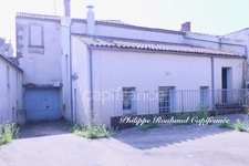Ensemble Immobilier d'Exception : Commerce et Locatif au Cœur d'une Cité de Caractère (220 m²)